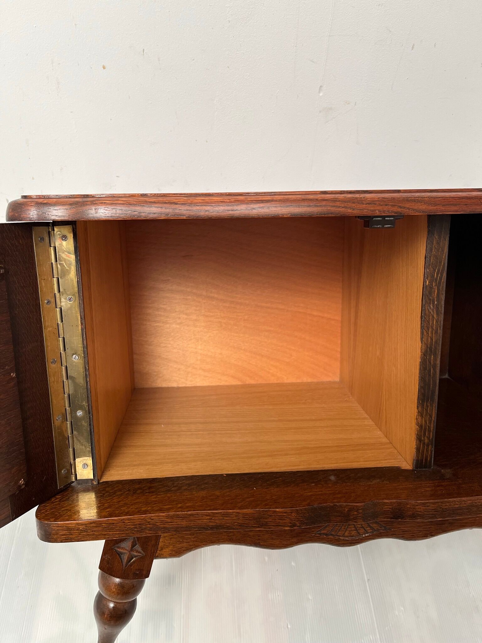 Vintage carved wooden bedside table