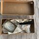 Old bicylindrical magnifier in its original vintage box