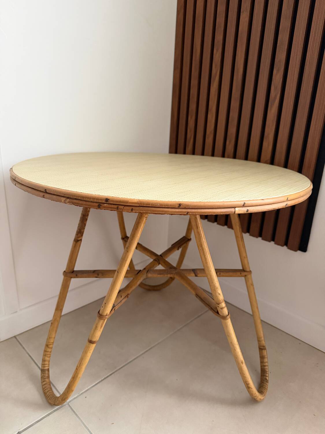 Vintage round tripod side table in rattan