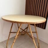 Vintage round tripod side table in rattan