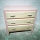 Vintage wooden and pink chest of drawers