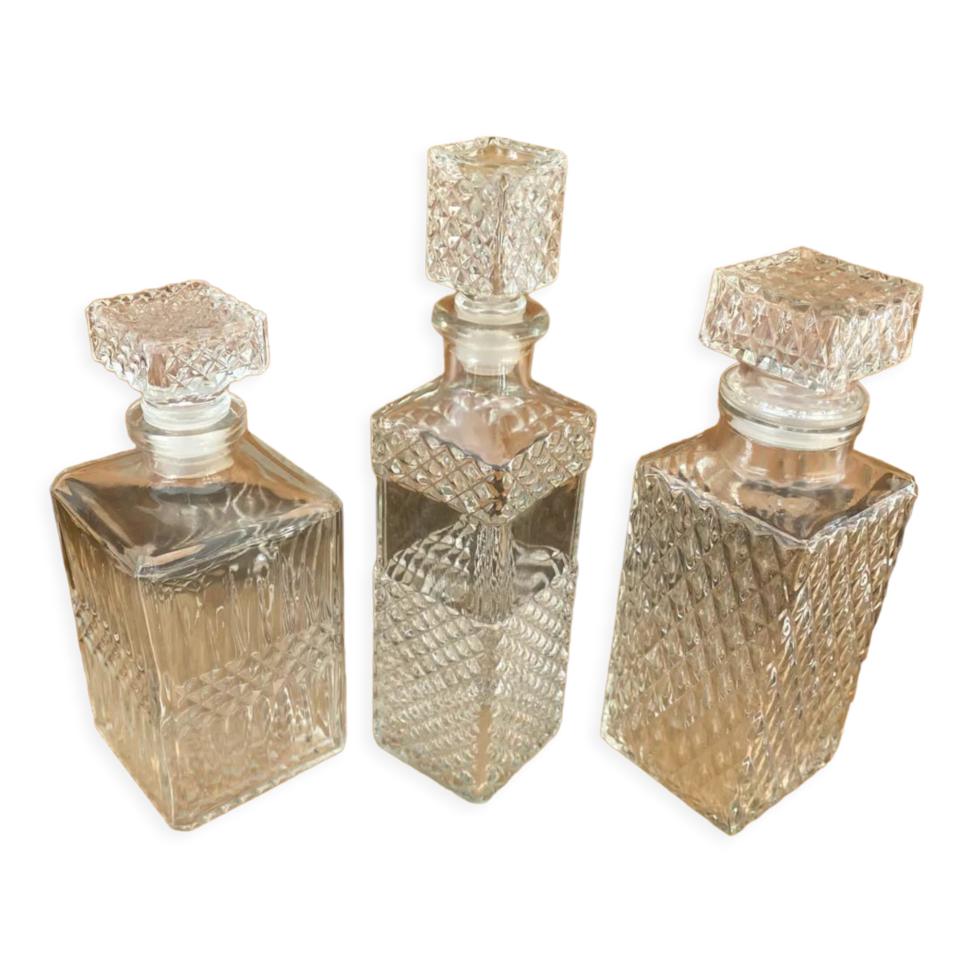 Set of 3 vintage whisky carafe bottles in molded glass