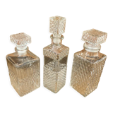 Set of 3 vintage whisky carafe bottles in molded glass