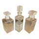 Set of 3 vintage whisky carafe bottles in molded glass