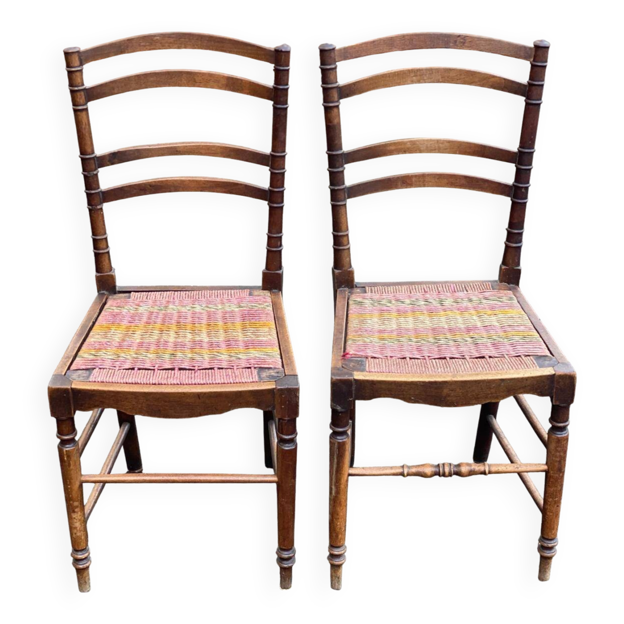 Two 19th-century carved chairs in solid wood and woven rope