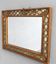 Miroir de style 1940 en bois doré ajouré