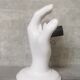 White ceramic hand wall lamp