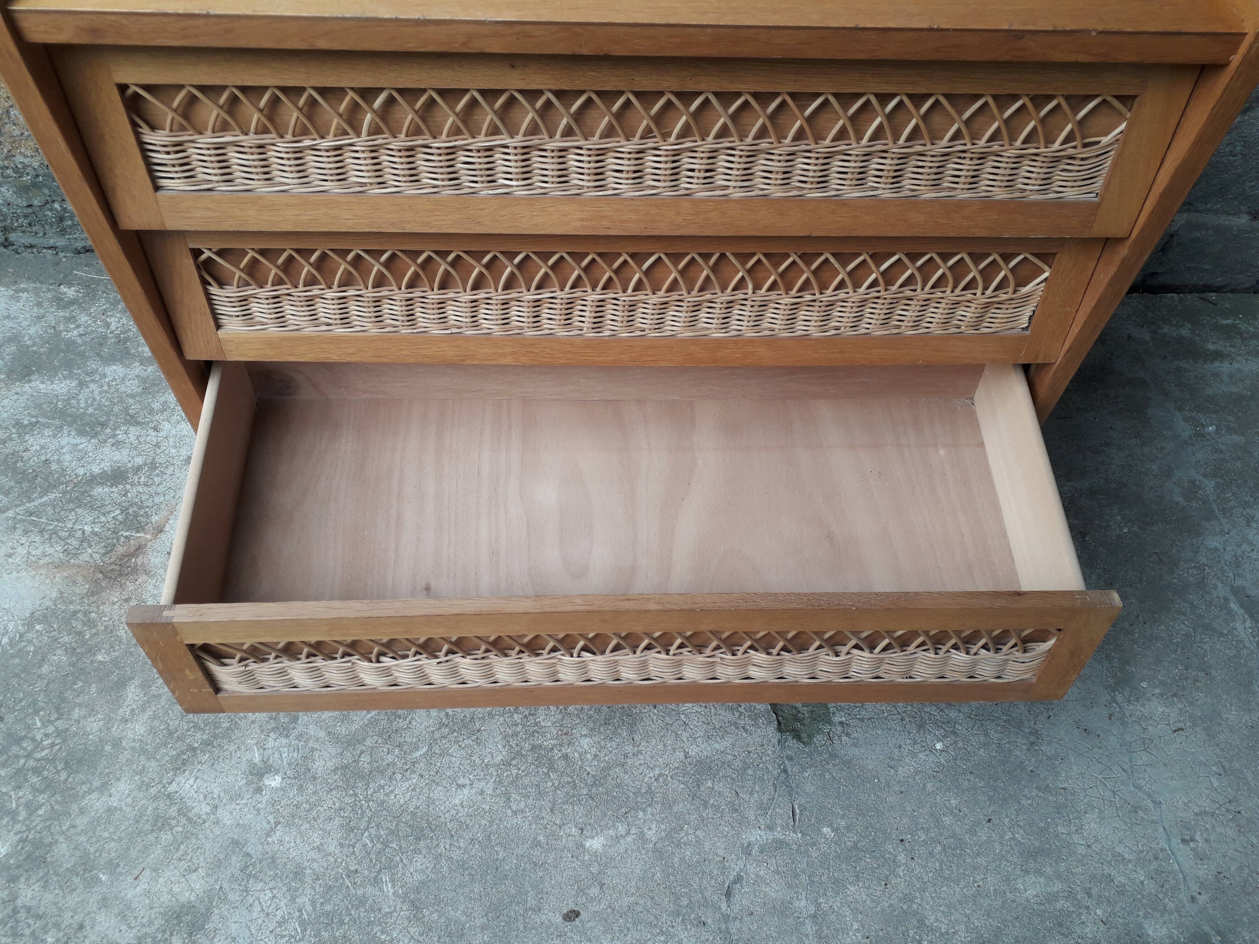 Vintage chest of drawers in rattan compass feet