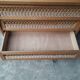 Commode vintage en rotin pieds compas
