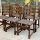 6 solid wood dining chairs with grey woven wool seats.