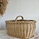 Large vintage wicker basket and blue lining with white polka dots