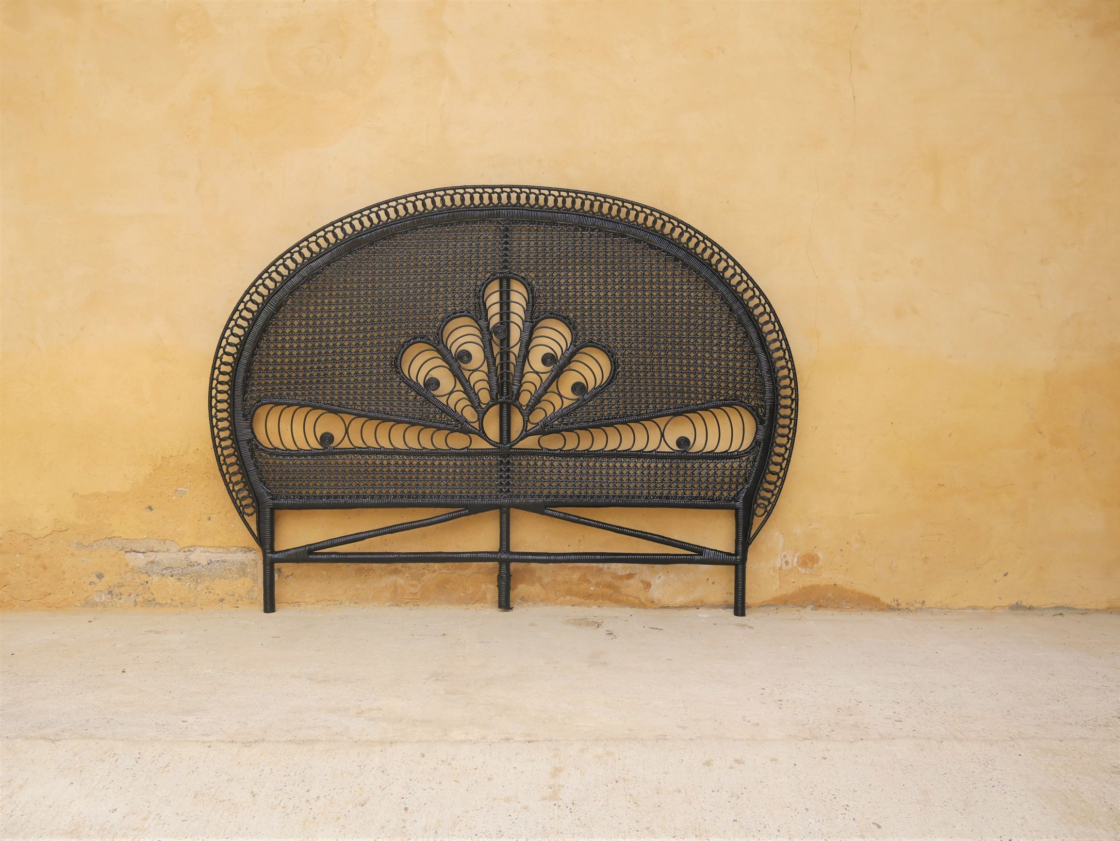 Vintage headboard in black rattan