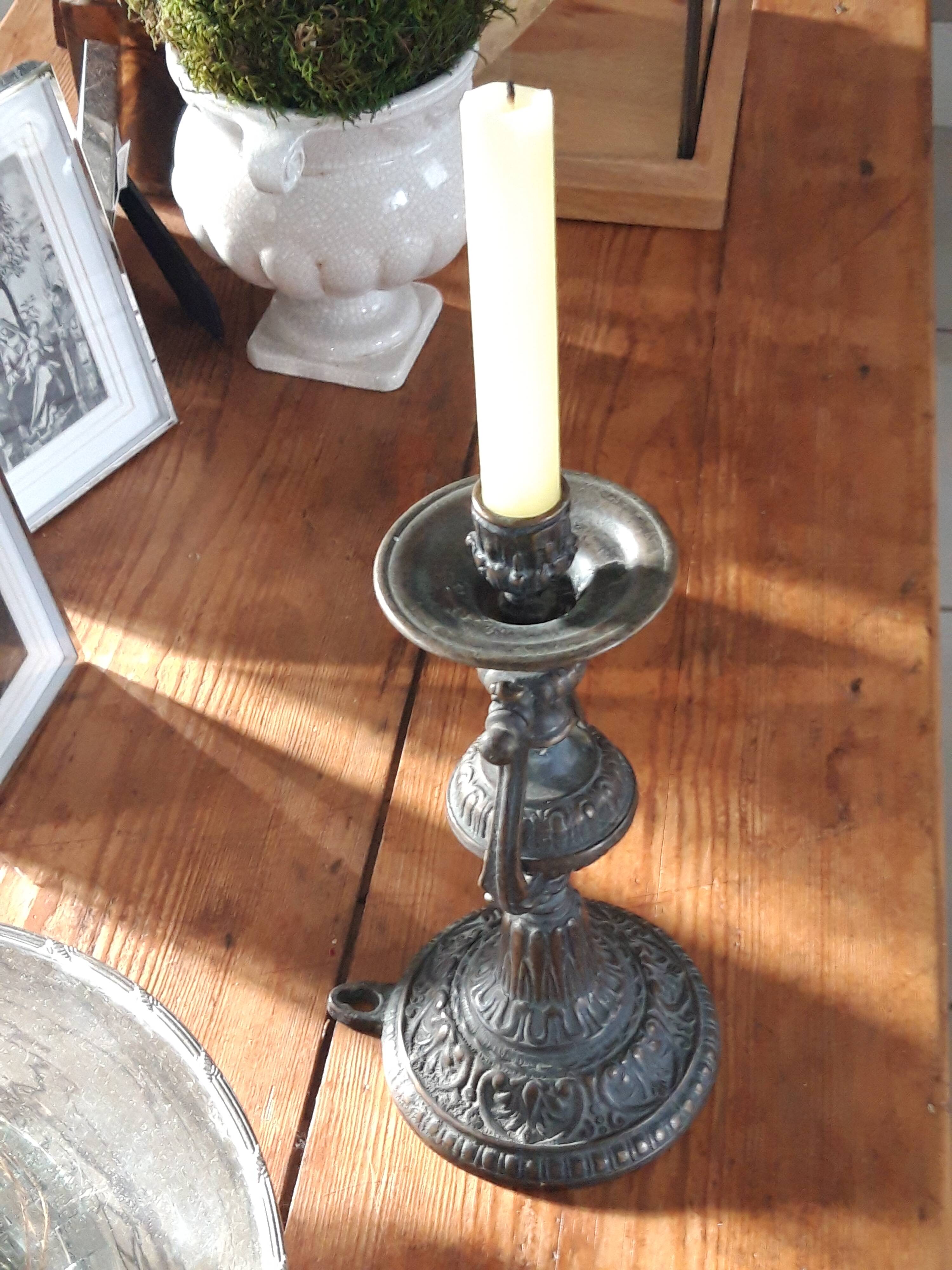 Bronze pendulum candle holder