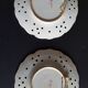 Old plates opened in handmade floral decoration