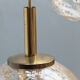 Four gold fleck globe pendants by Doria Germany