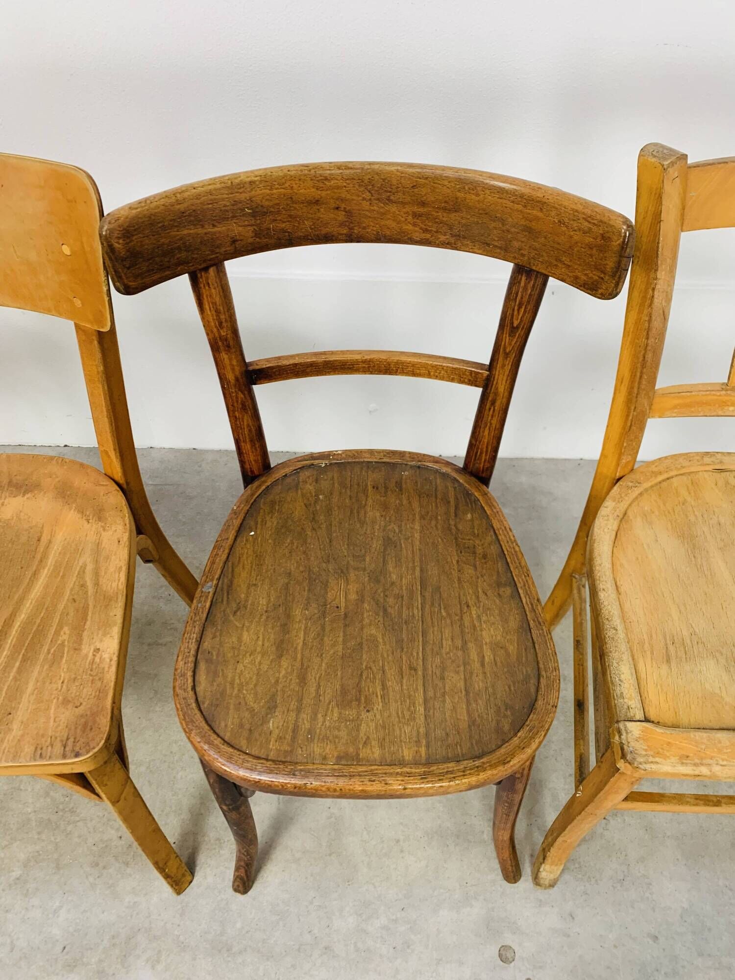 6 mismatched Baumann & Luterma bistro chairs, wood, 1960s