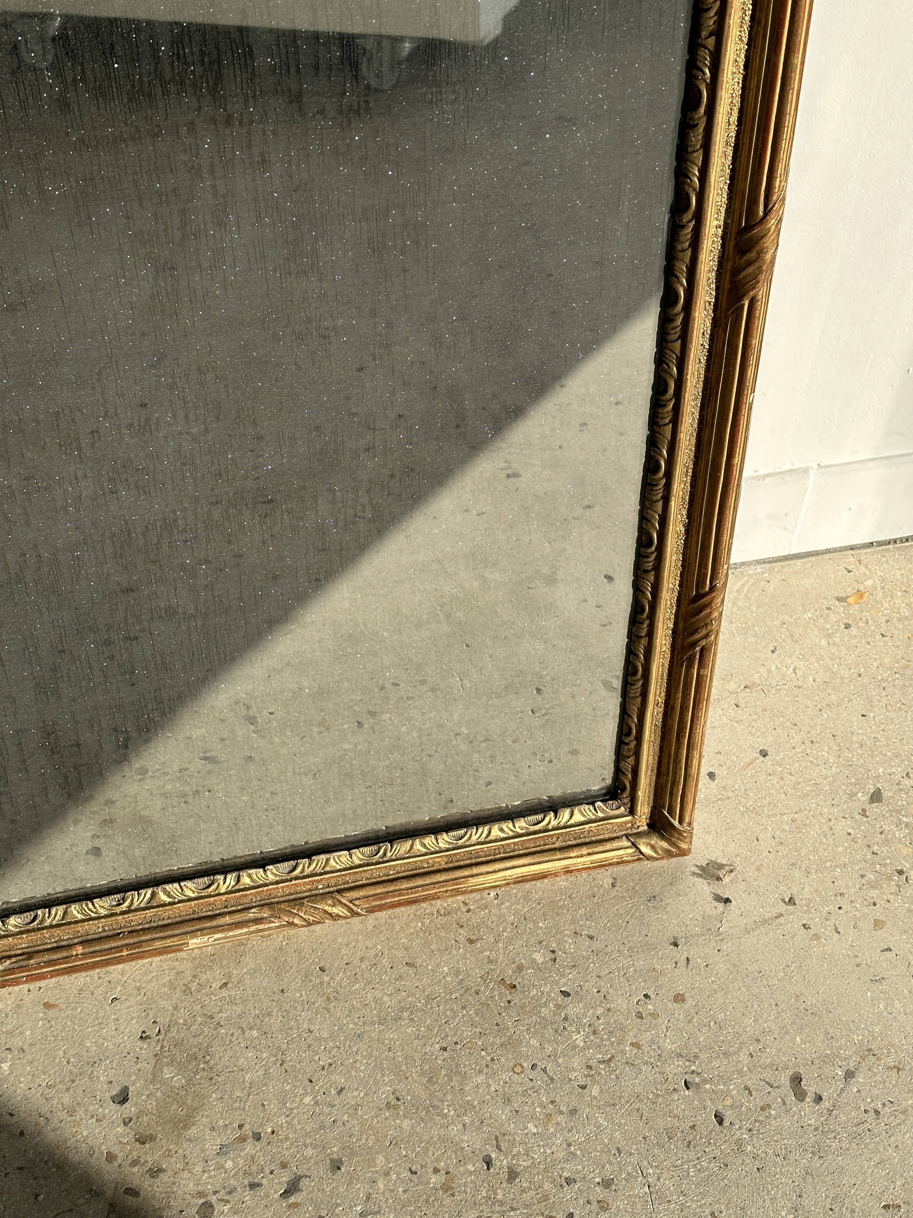 Large gilded mirror 19th century rounded corners mercury glass Louis XVI style