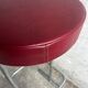 Ensemble de 4 tabourets de bar industriels – sièges bordeaux (années 1980)