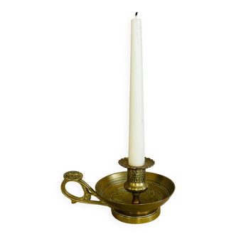 20th century chiseled brass socket candle holder representing Horsemen in armor