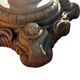 Antique cast iron garden table with decorative openwork top.