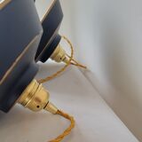 Duo of suspensions in enamelled sheet metal