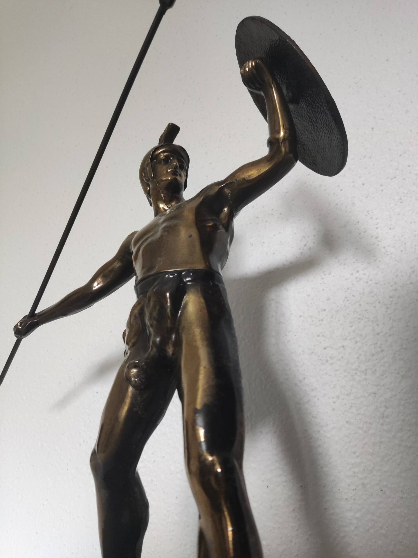 Large statue of Achilles, Greek warrior, marble base, ancient mythology.
