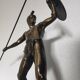 Large statue of Achilles, Greek warrior, marble base, ancient mythology.