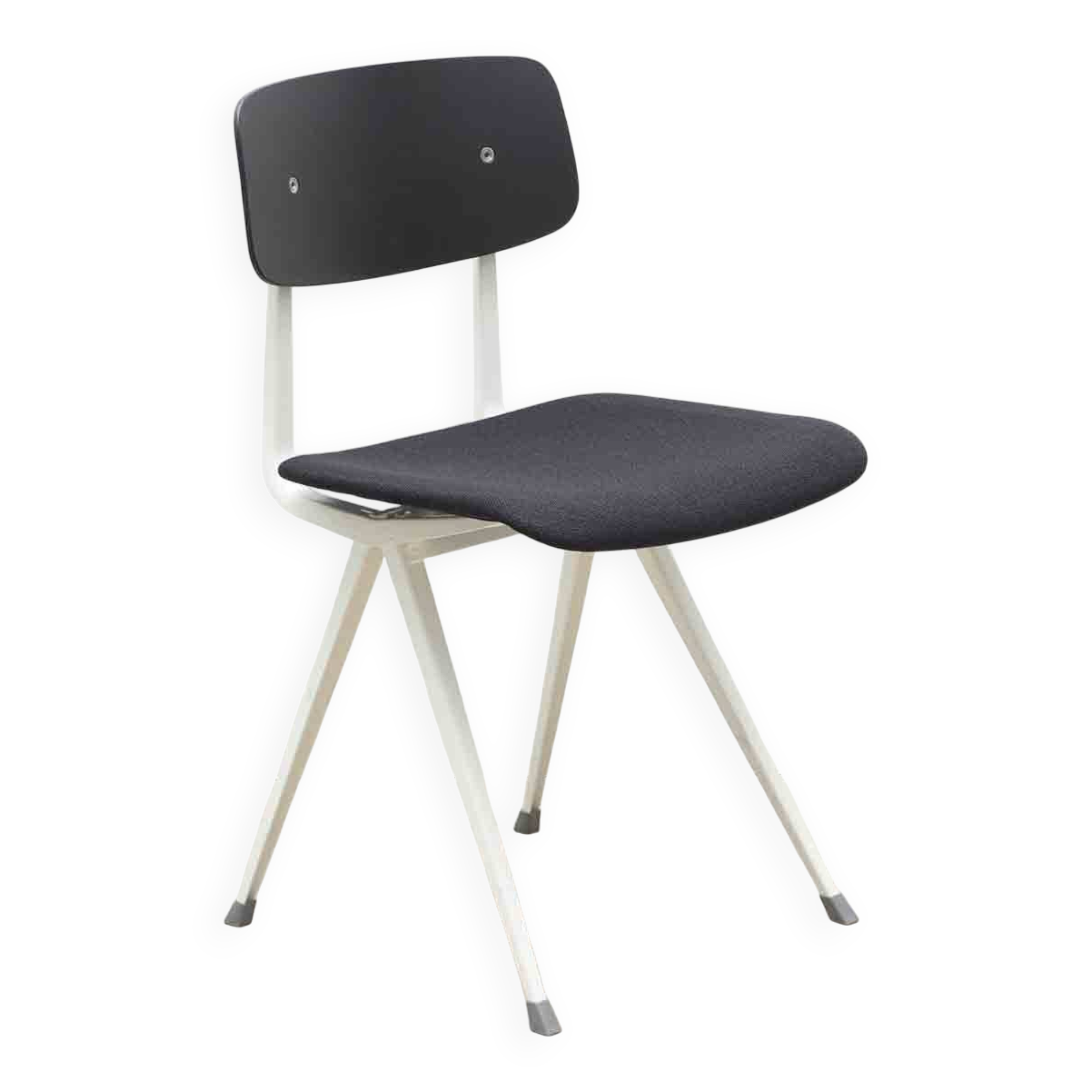 Friso Kramer "Result" chair upholstered in black and white.