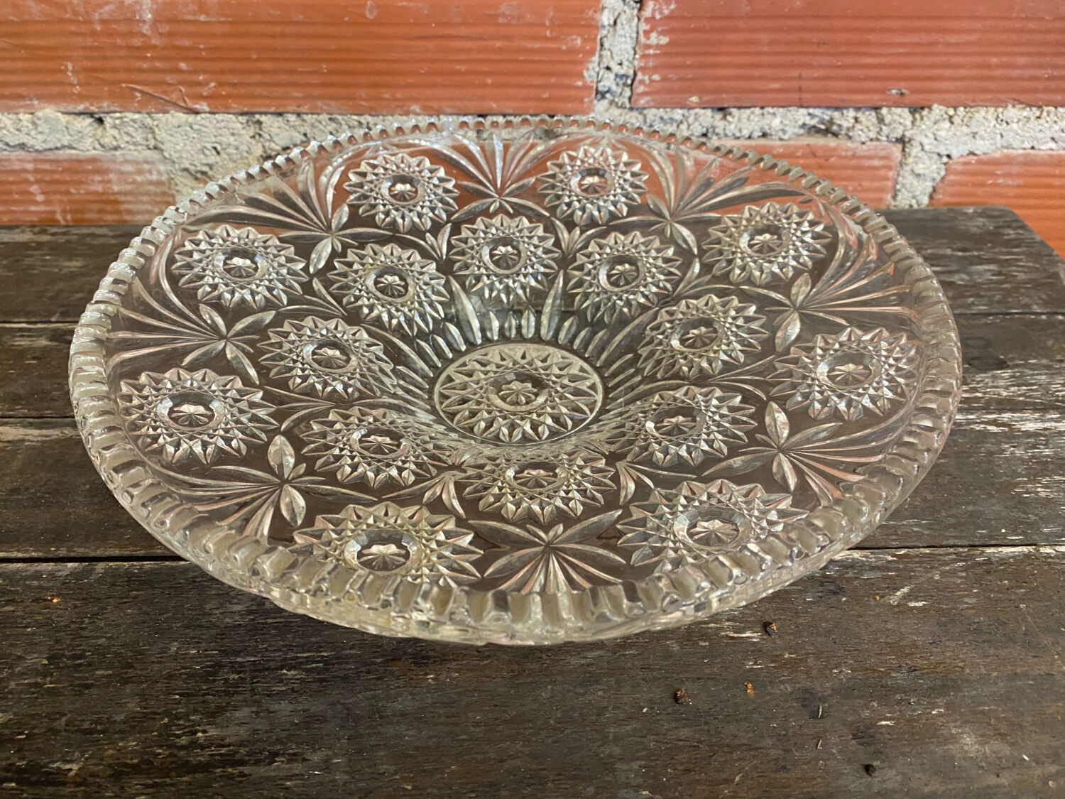 Cut glass fruit bowl with carved star decoration.