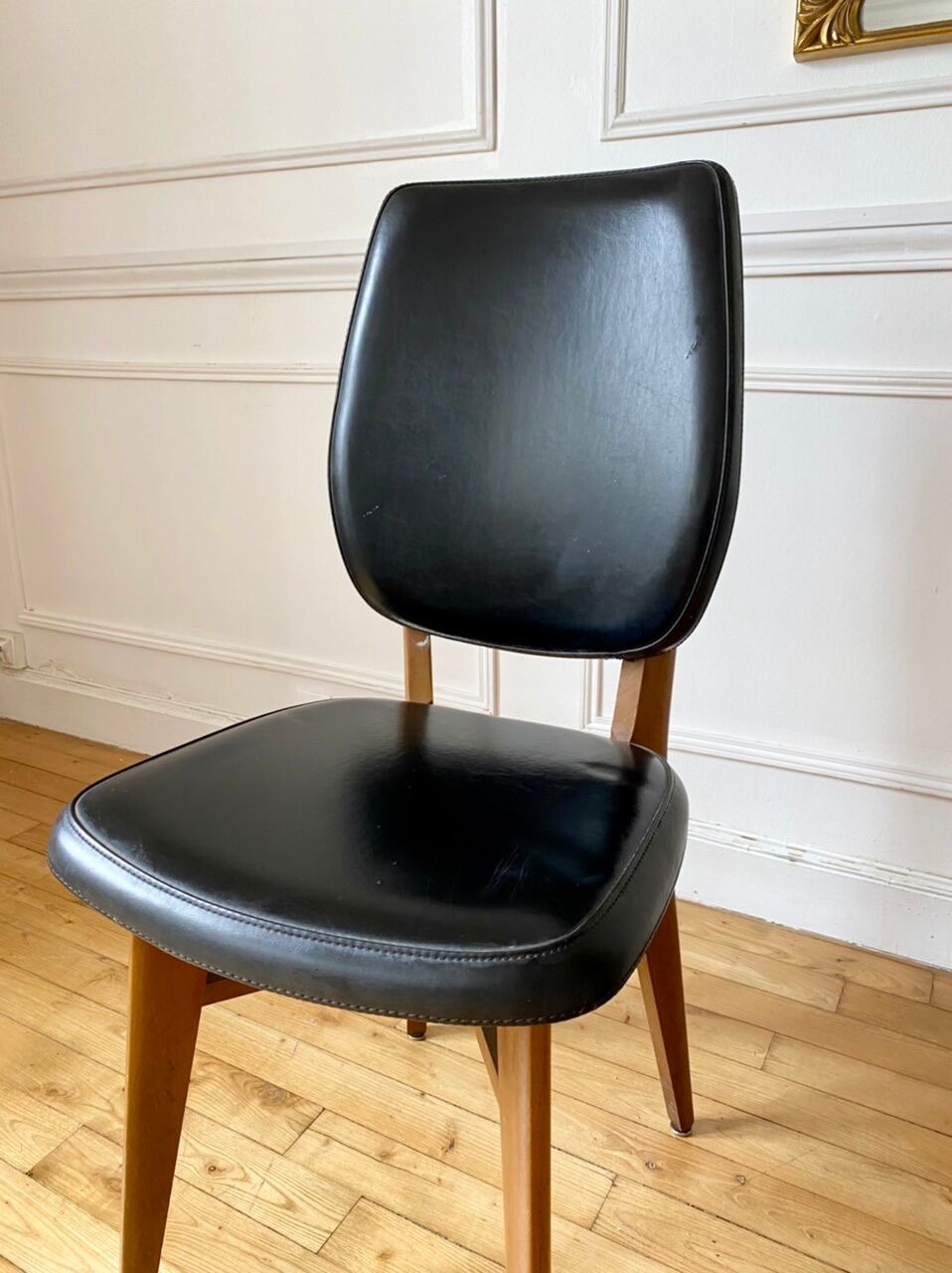 Pair of vintage wood and leather chairs