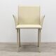 Beige leather chair with armrests