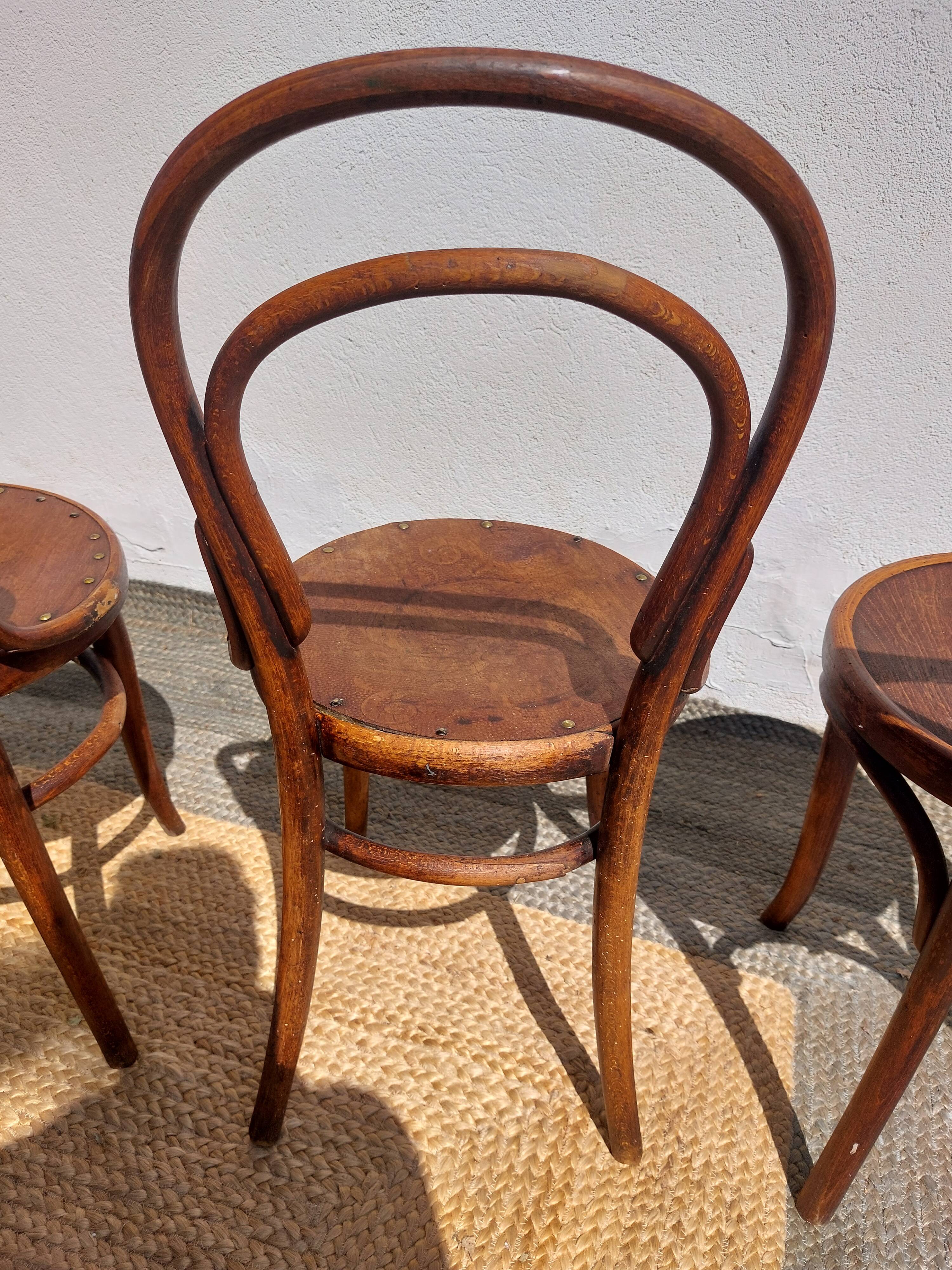 4 curved wooden bistro chairs