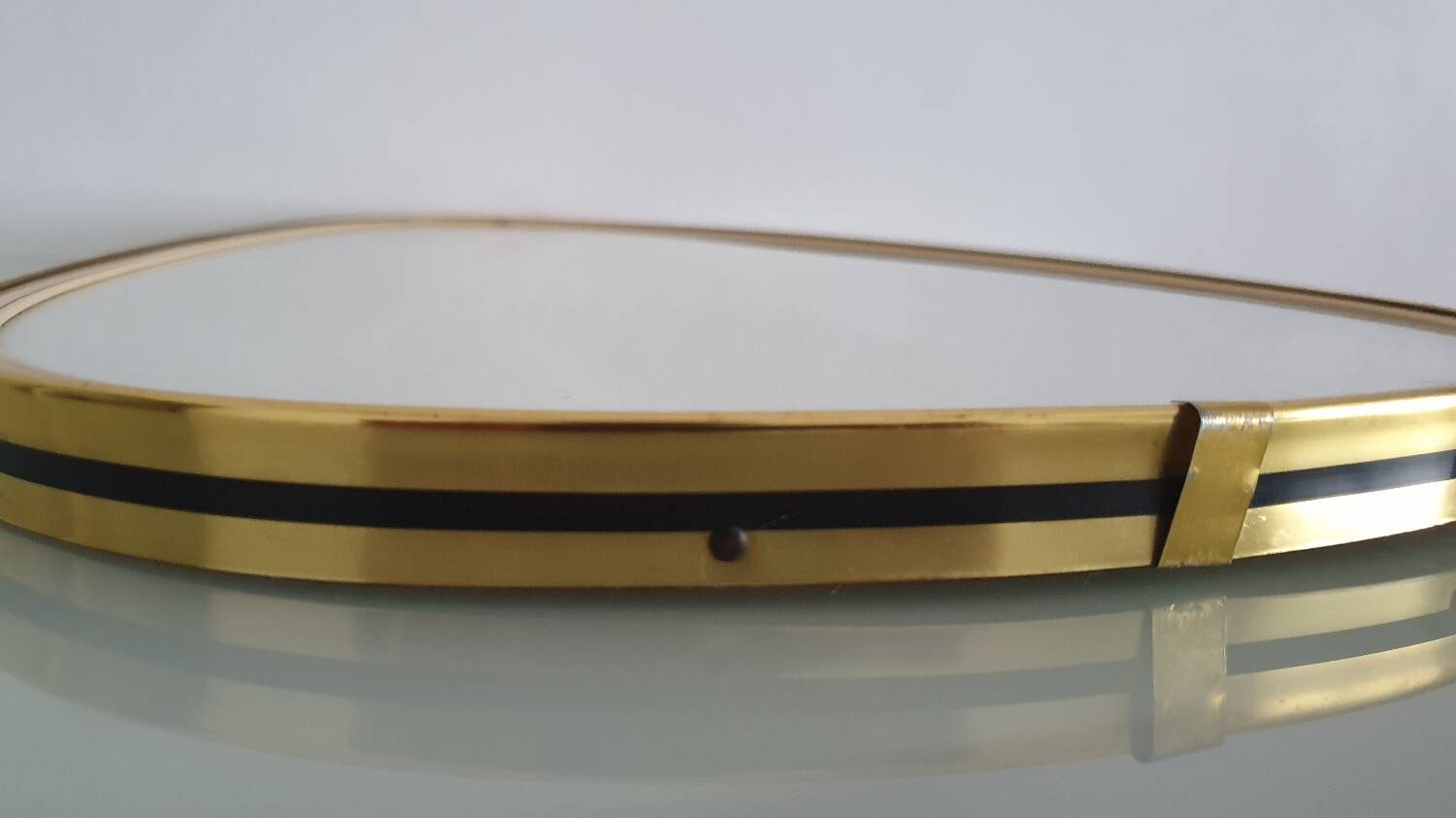 Vintage ovoid mirror with gold and black edges - 1960s