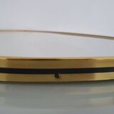 Miroir ovoïde vintage bords doré et noir - années 1960