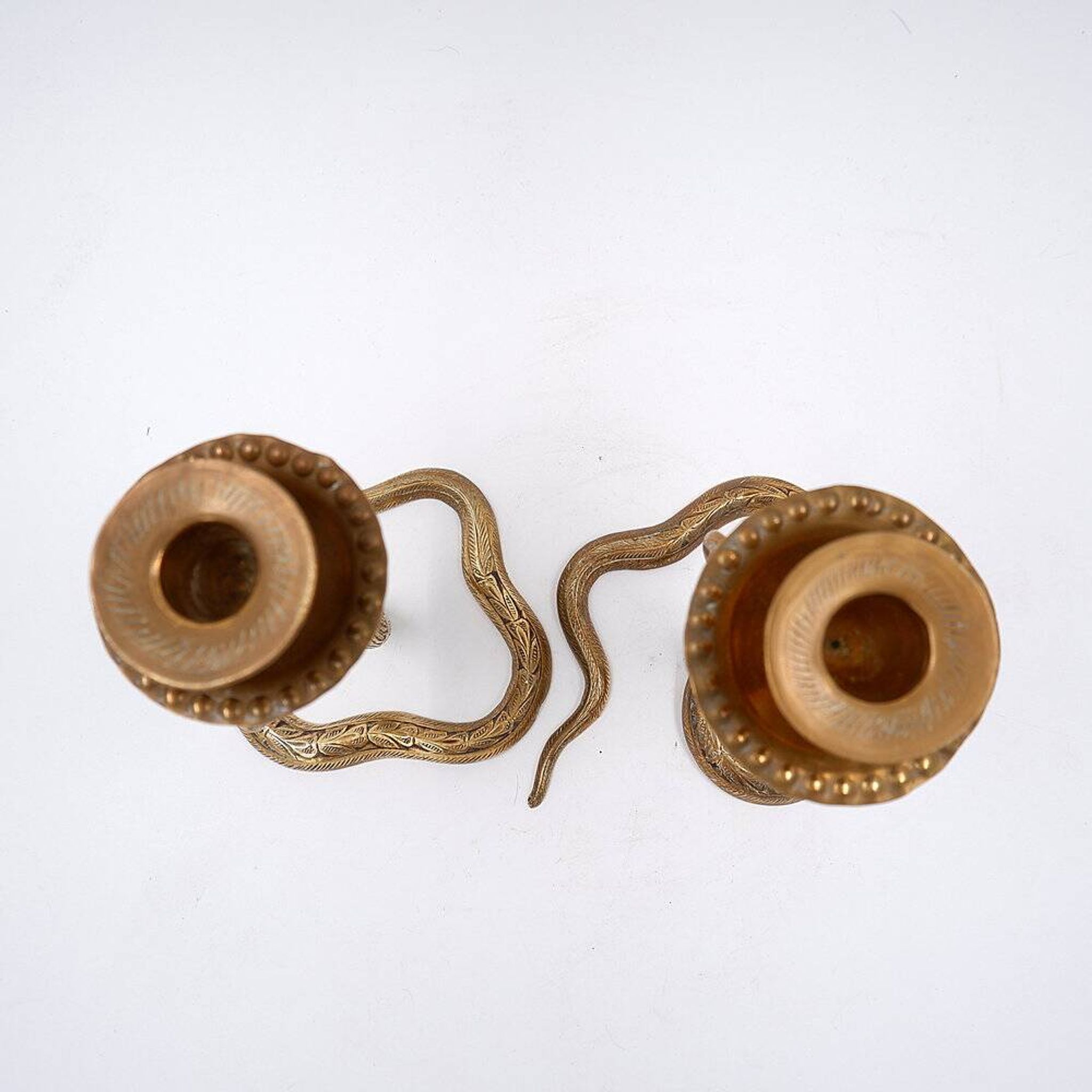 Pair of engraved brass cobra candlesticks - 1960s