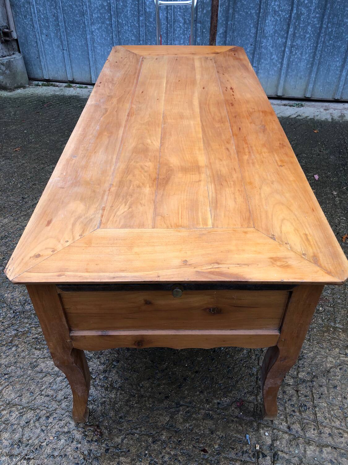 Antique Louis XV table with 3 drawers and 1 pull-out in solid cherry wood