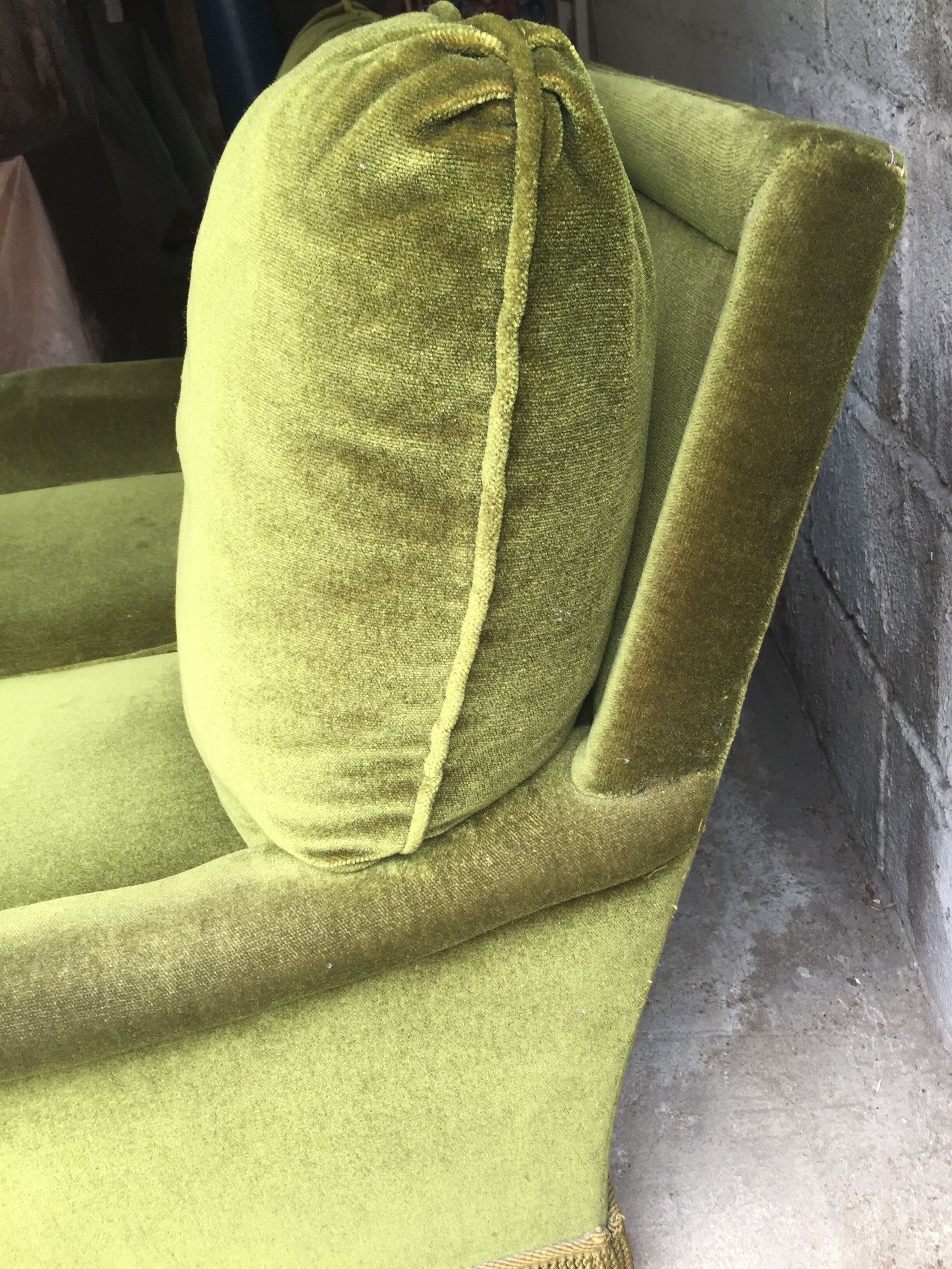 Vintage green velvet sofa