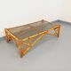 Vintage rectangular coffee table in rattan and smoked glass from the 1970s.