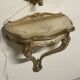 Pair of wall-mounted consoles with a mirror in Louis XV style.