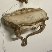 Pair of wall-mounted consoles with a mirror in Louis XV style.