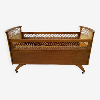 Wood and rattan baby bed