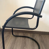 Vintage black sleigh armchair