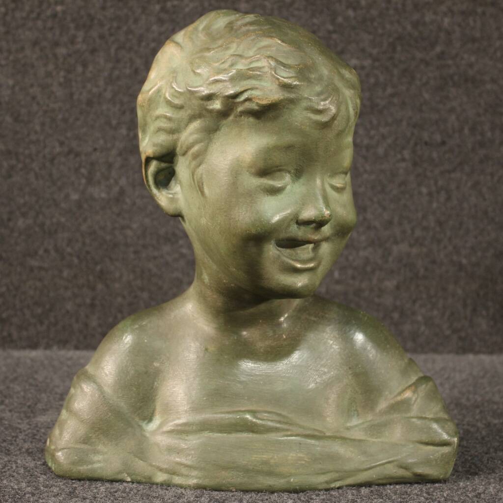 Sculpture in bronze painted terracotta bust of a child