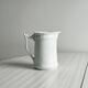 White porcelain milk jug