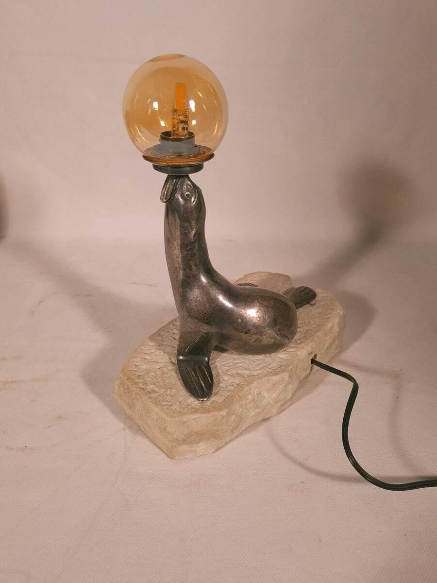 Art Deco "sea lion" lamp in silver-plated bronze
