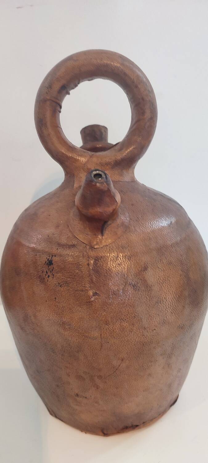 Gargoulette, terracotta jug covered with leather