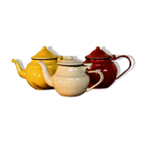 Trio of small enamelled teapots
