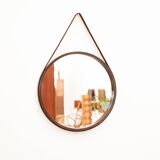 Round mirror in walnut