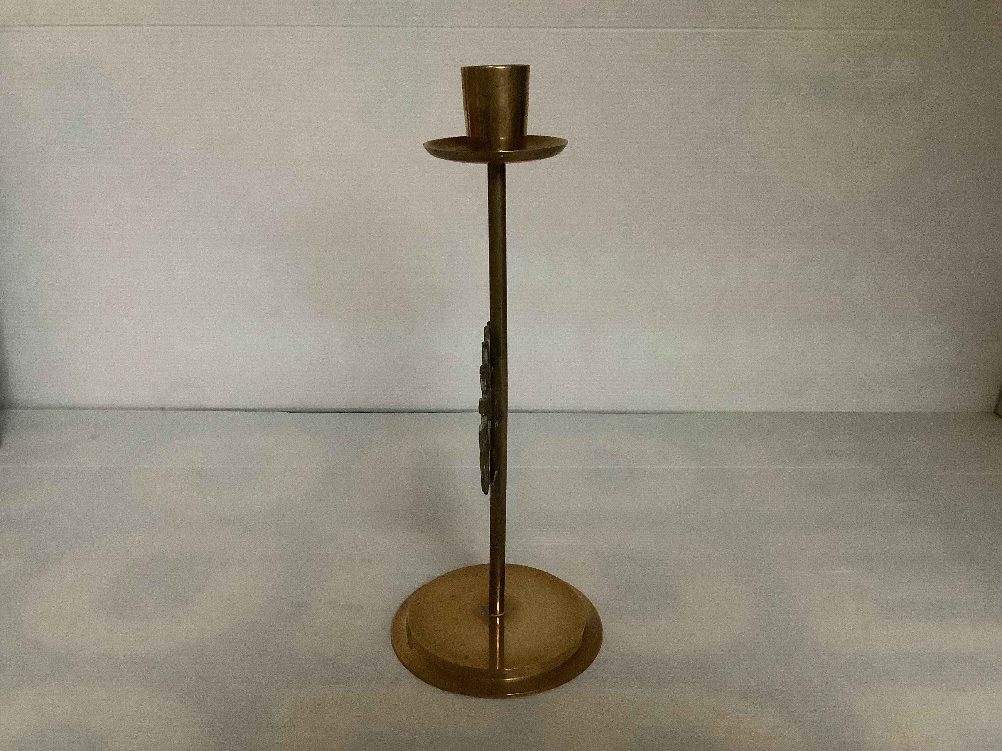 Brass sunburst candle holder