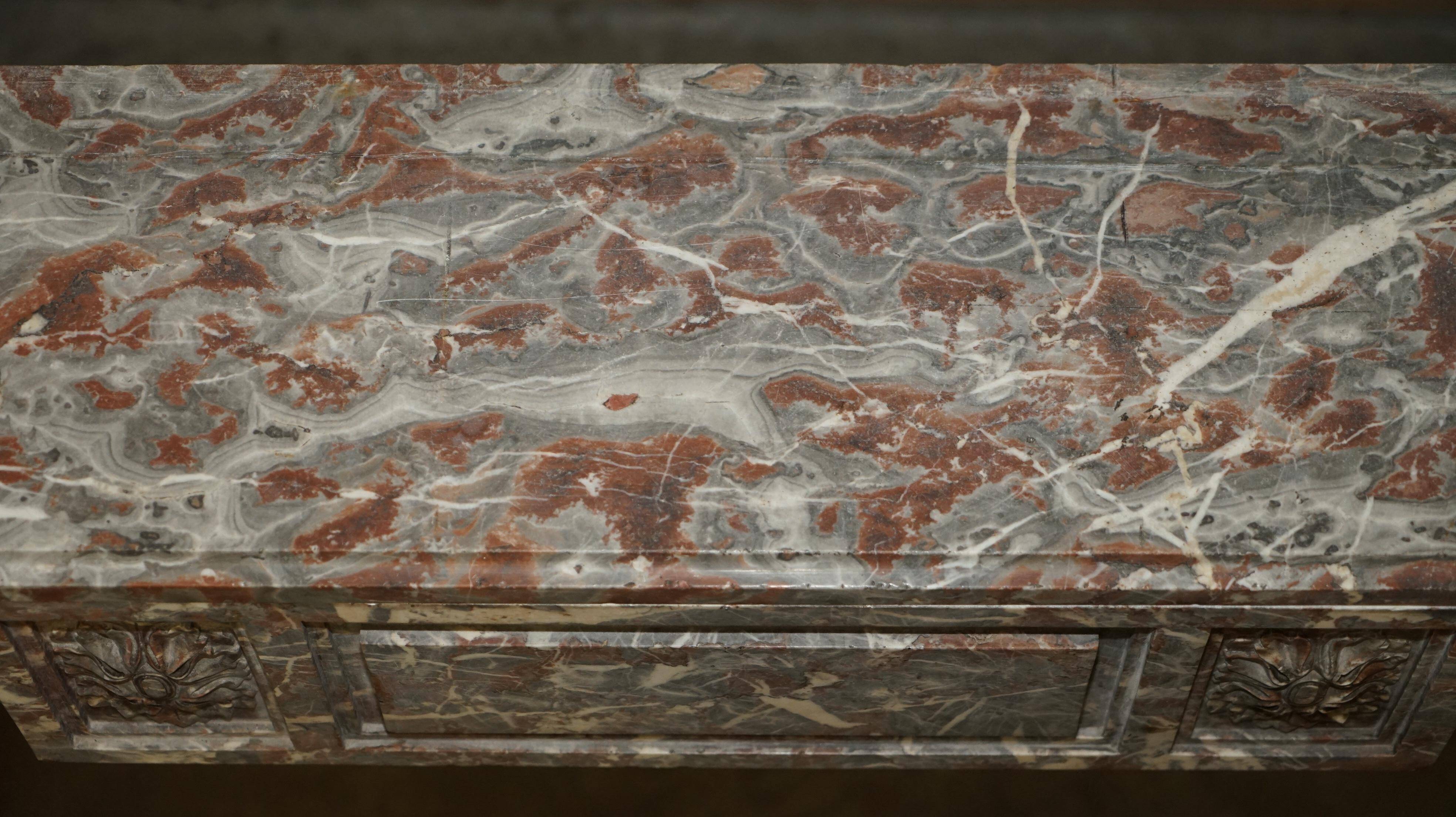Antique marble fireplace in Saint Remy, Louis XVI style.